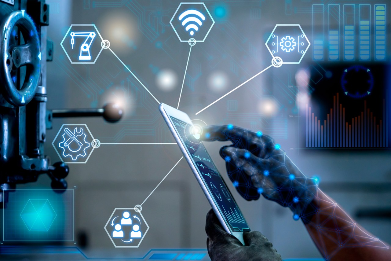 engineer-using-tablet-to-control-machinery-getty-1285575560