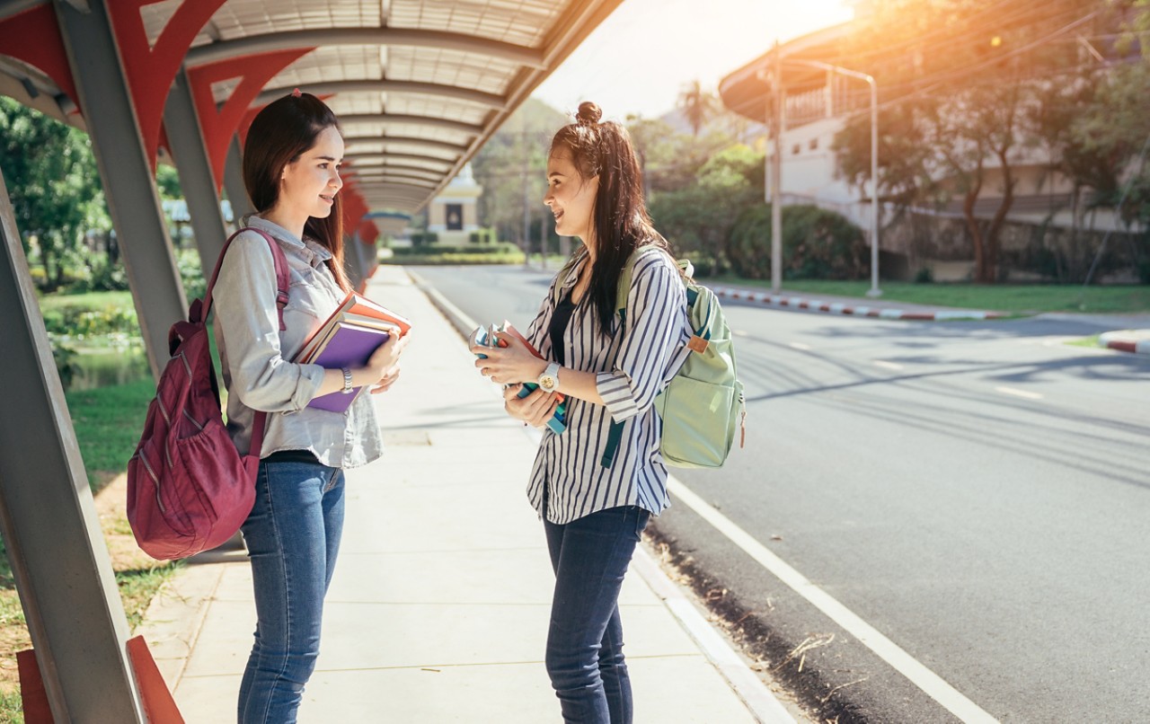 students-at-bus-shelter-getty-929003670