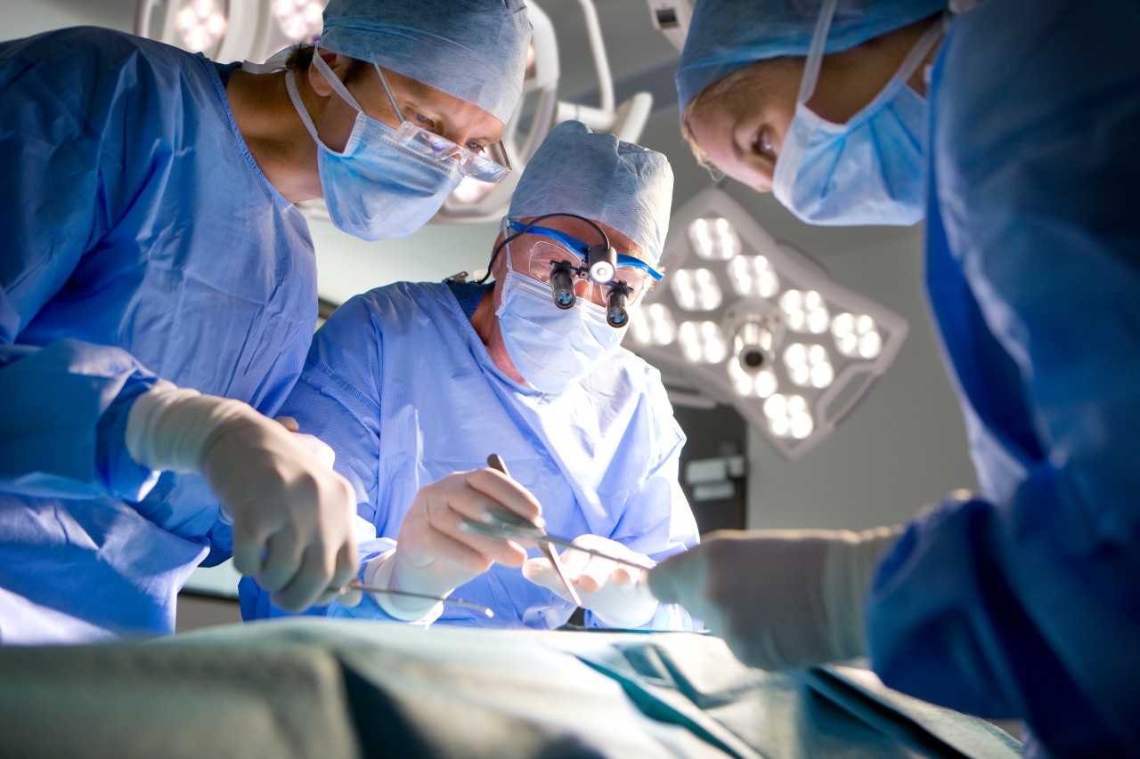 Concentrating surgeons performing operation in operating room