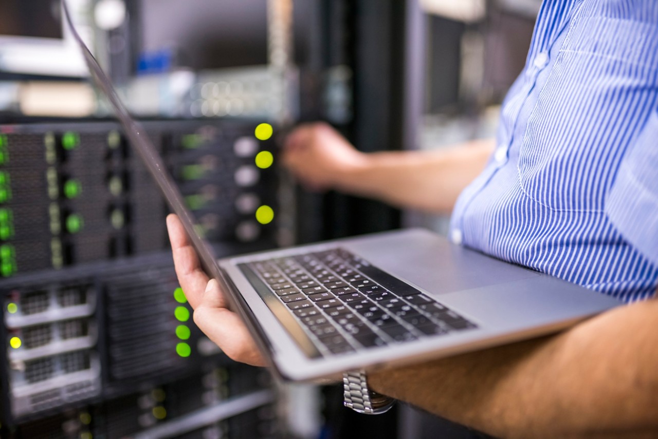 engineer-in-server-room-closeup-getty-975807342